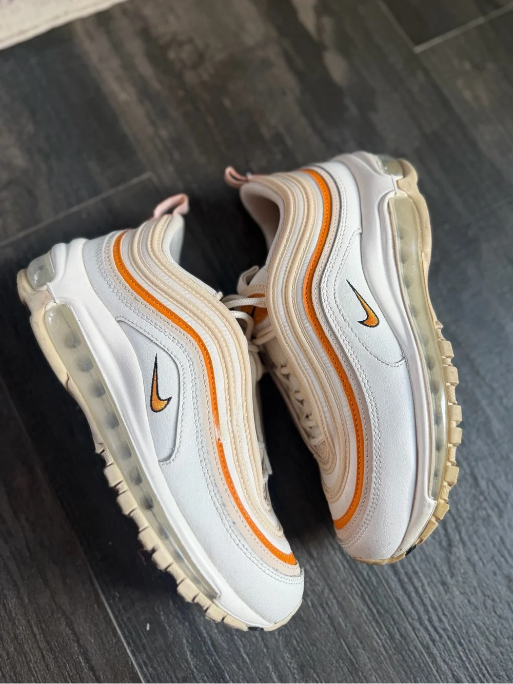 Nike Woman’s White Sneakers with Orange Accents
